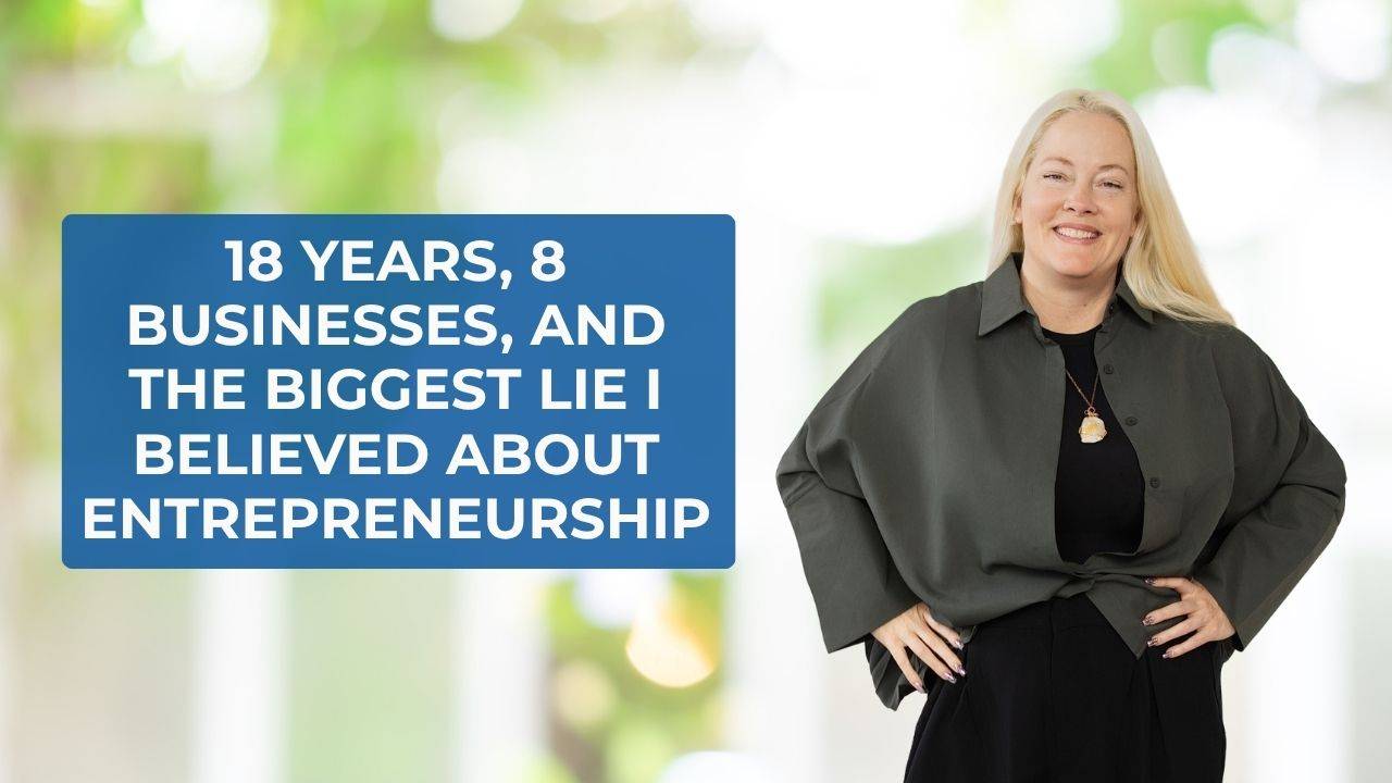 Blonde woman wearing a black shirt, black pants, a gray jacket, and a gold necklace posing with her hands on her hips smiling and words on the screen that say, "18 Years, 8 Businesses, and the Biggest Lie I Believed About Entrepreneurship"