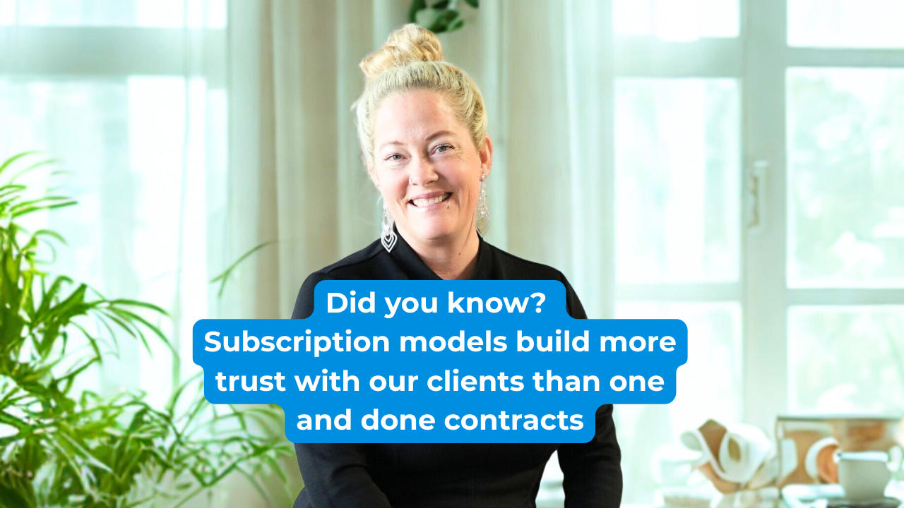 Woman standing in black dress smiling