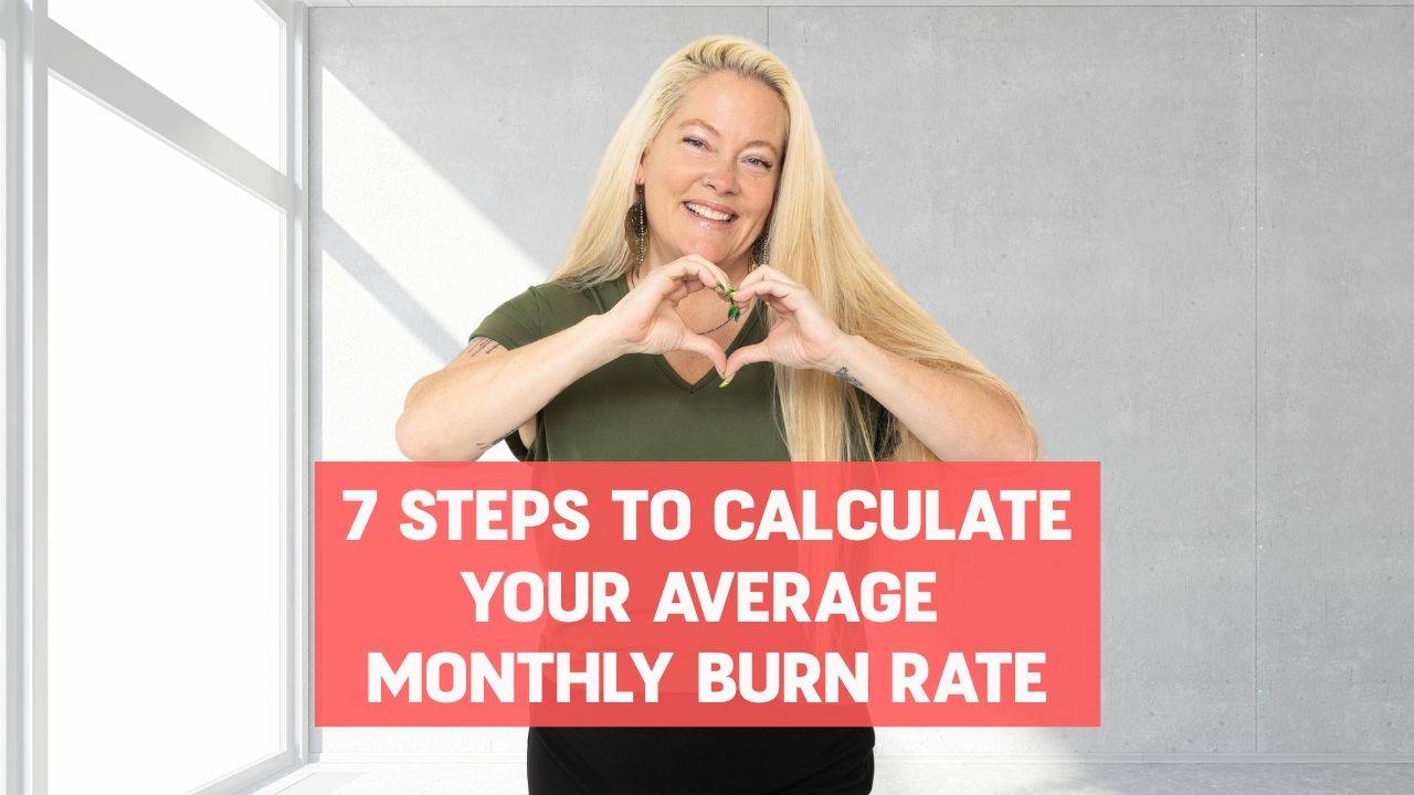 Woman wearing olive green shirt and black pants smiling and making a heart shape with her hands with words on the screen that say, "7 Steps to Calculate Your Average Monthly Burn Rate"