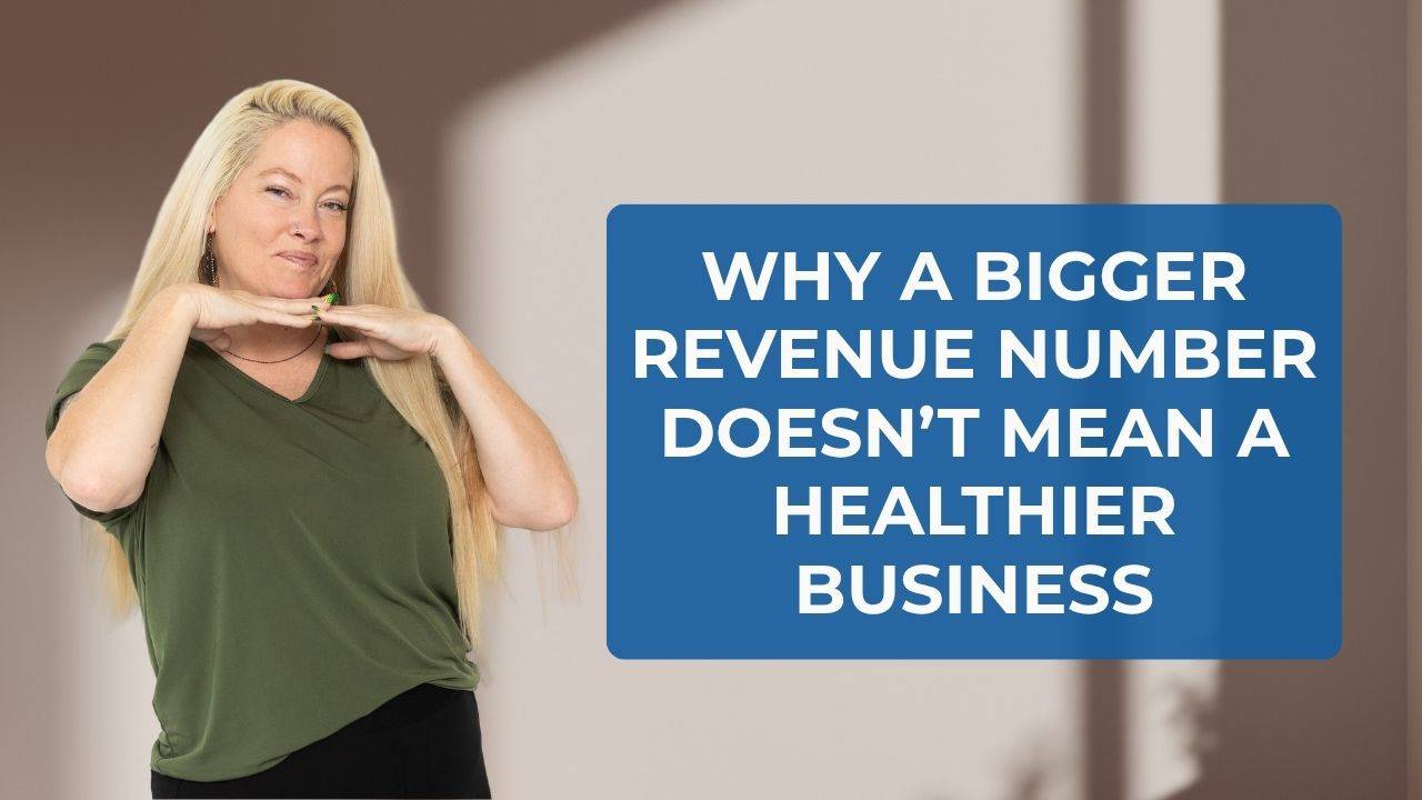 Blonde woman wearing an olive green v-neck shirt with black pants smiling and posing with her hand horizontally under his chin with words on the screen that say, "Why A Bigger Revenue Number Doesn’t Mean a Healthier Business"
