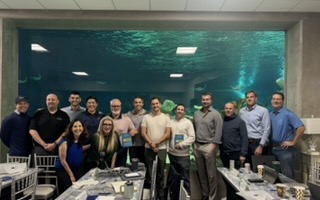 Vered Kogan with a group of event attendees