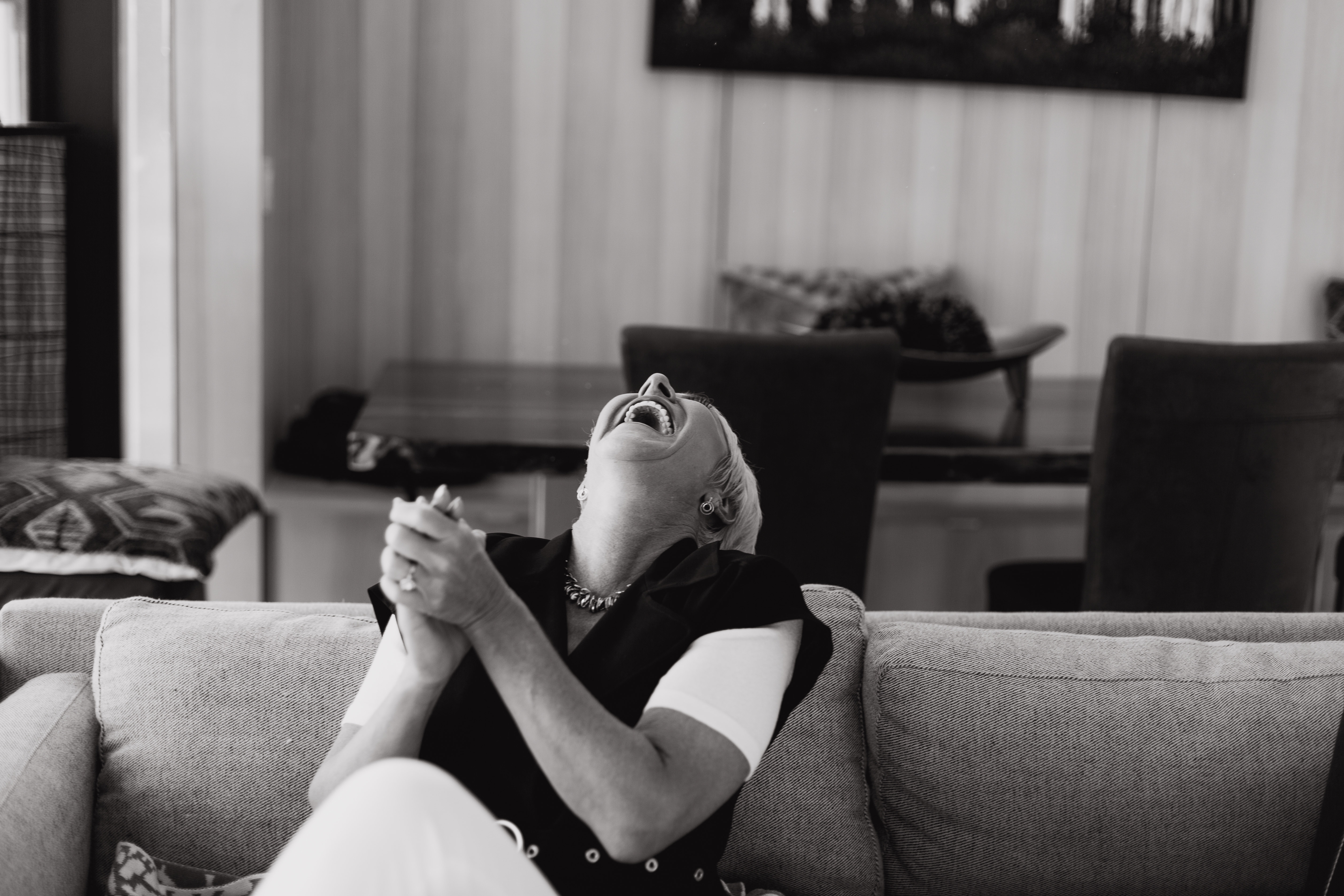 Brooke Hicks laughing behind the scenes at a School retreat