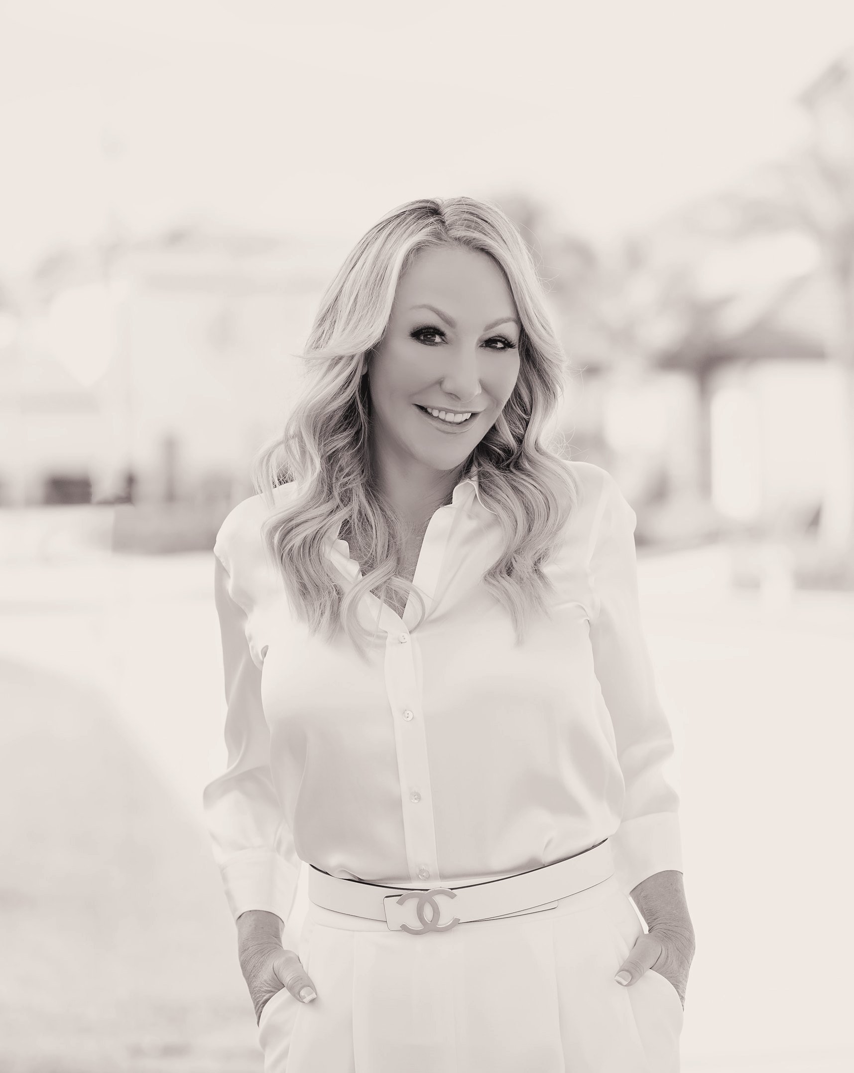 Brooke Hicks in a white shirt, smiling