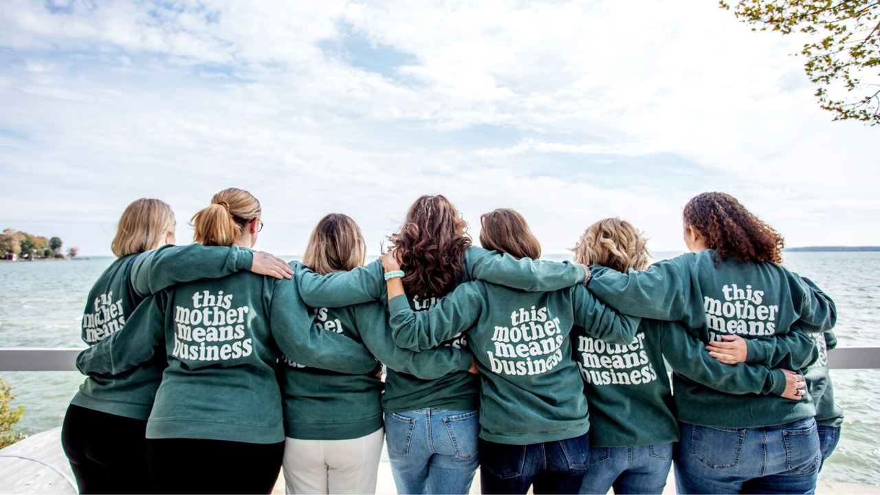 TMMB members in branded sweatshirts