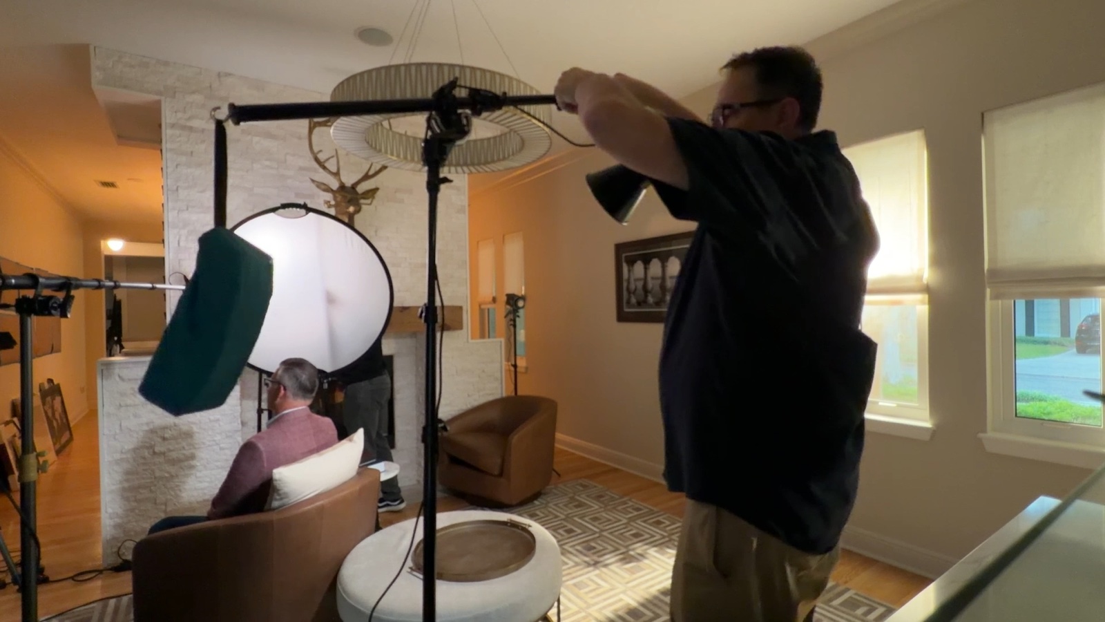 Adjusting the three-quarter backlight behind the interview chair