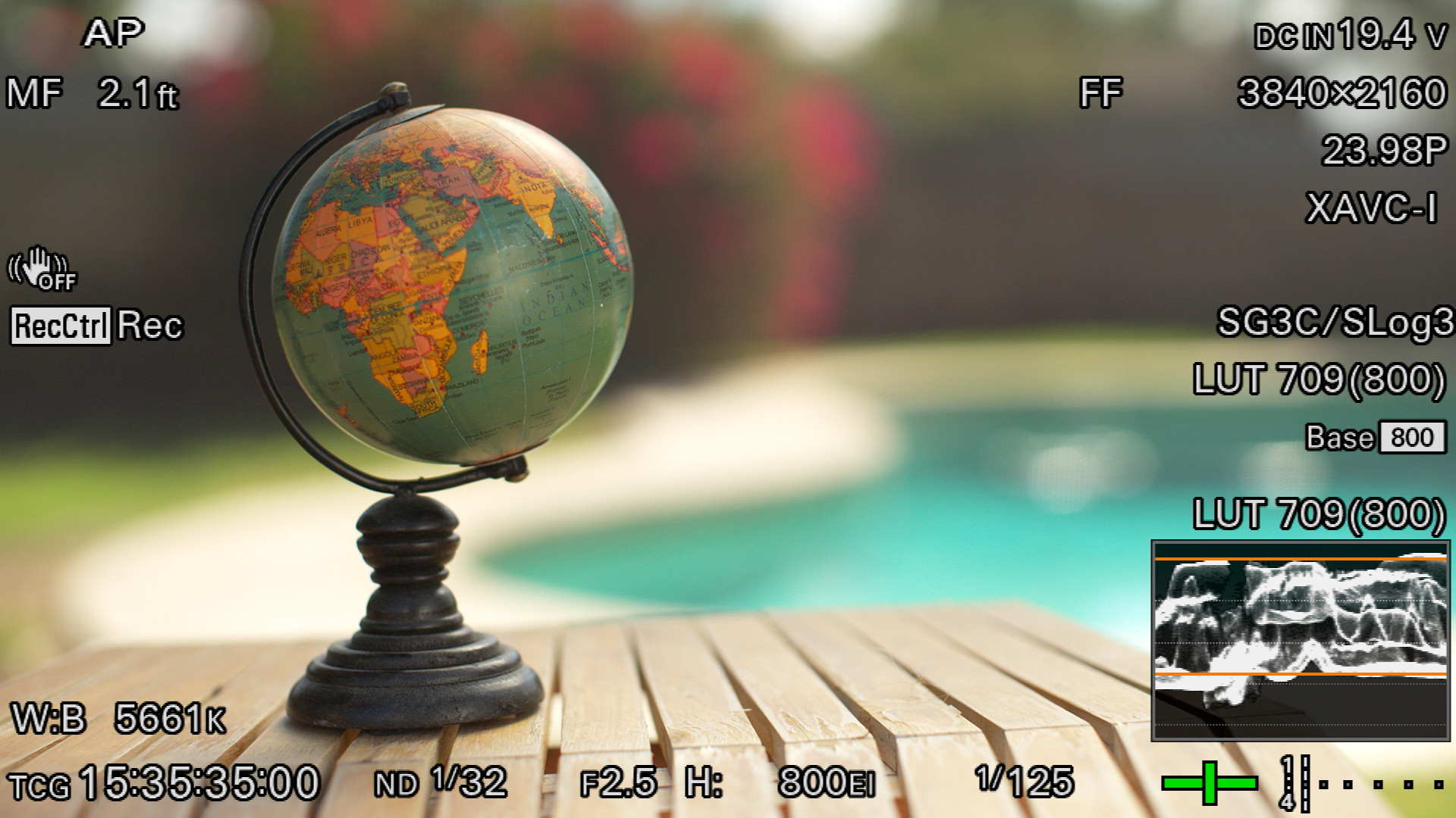 Silver reflector pushed through diffusion to create a softer controlled highlight on the globe
