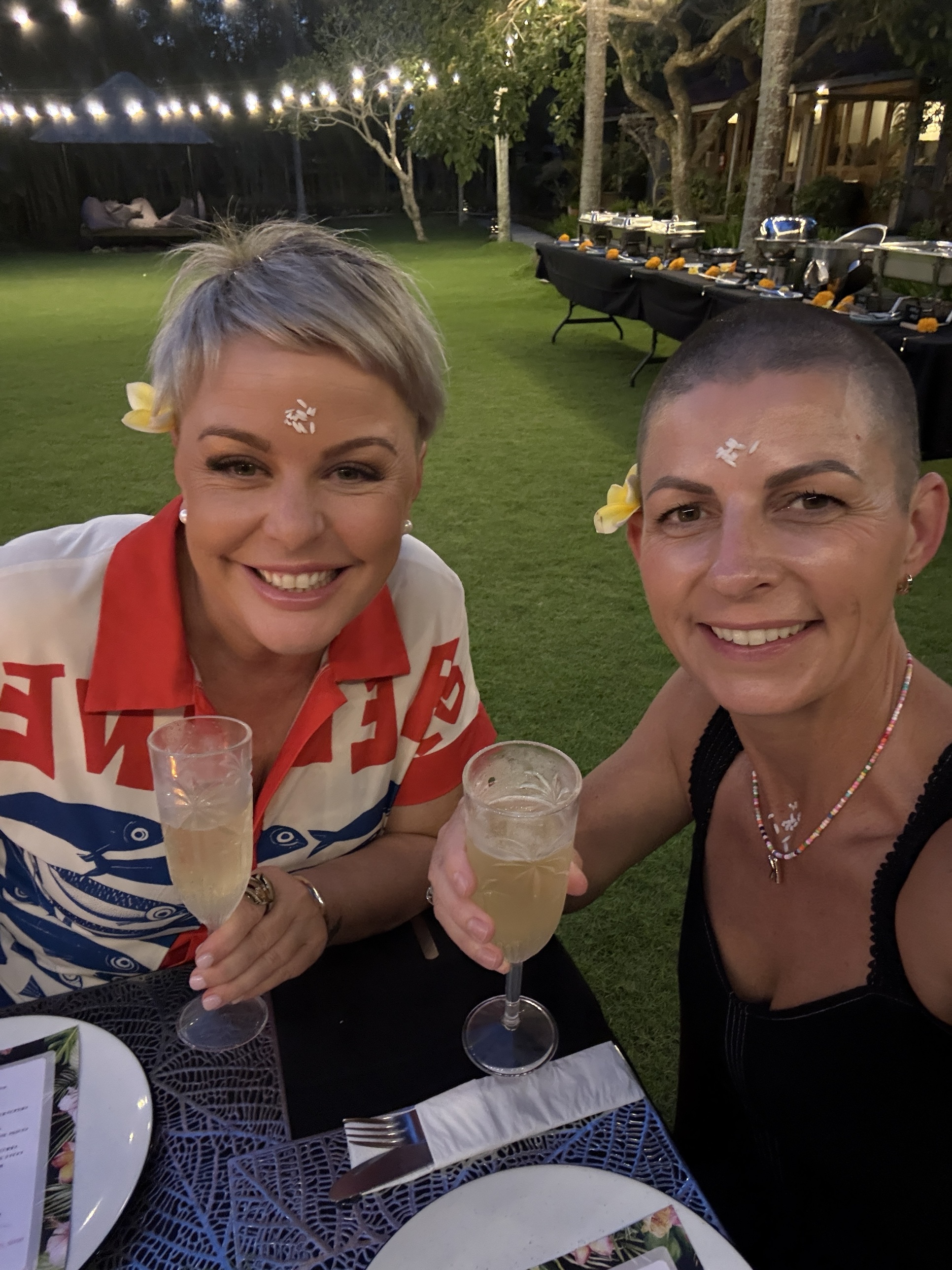 Shez and Kell, SheKan co-founders, toasting together at RECHARGE Bali retreat