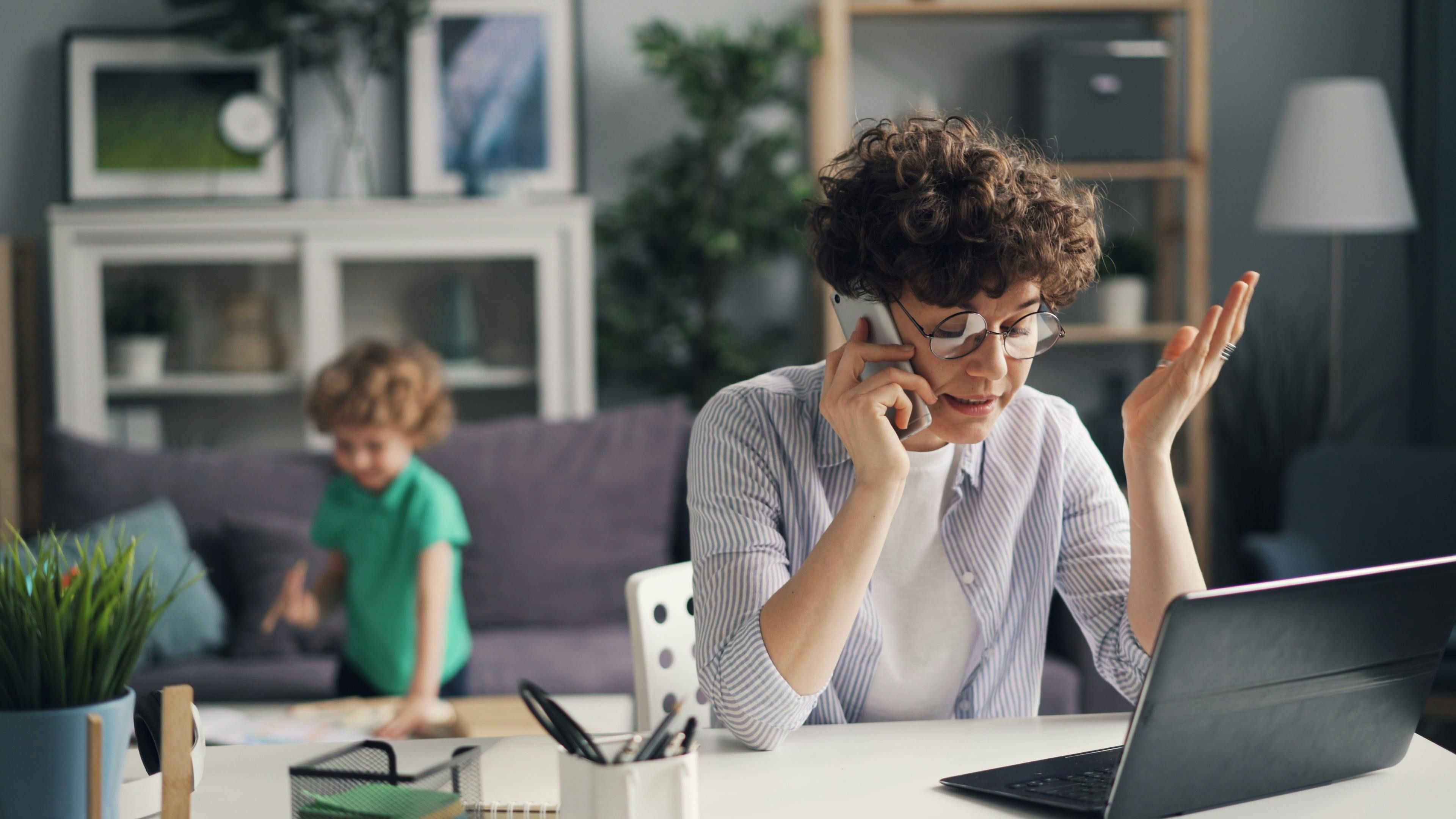 Midlife woman managing the mental load of everyday responsibilities