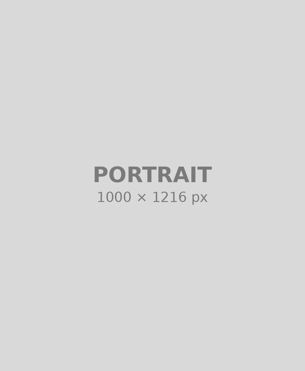 Hannah with the quilt she made