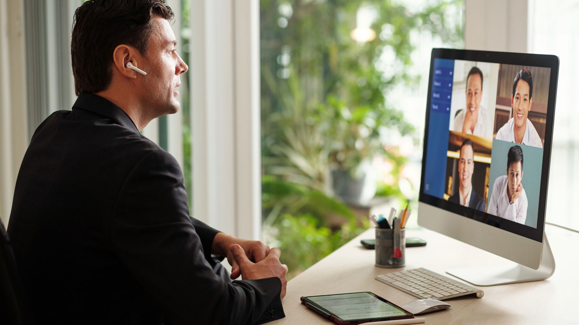 Man in Zoom meeting after using virtual checklist