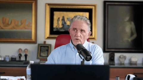 Mark Ford speaking into a microphone