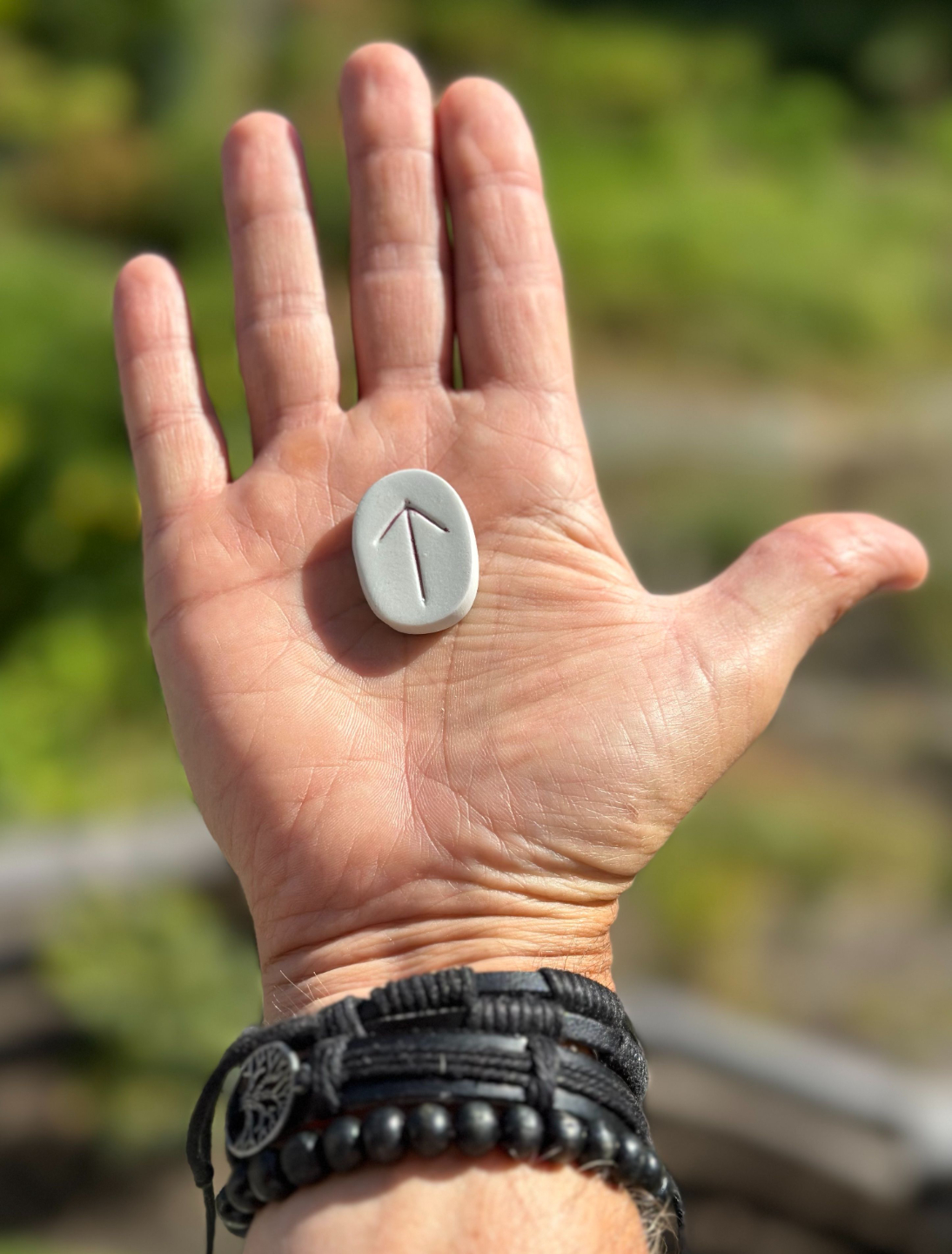 Viking Academy Hand with Rock with Arrow