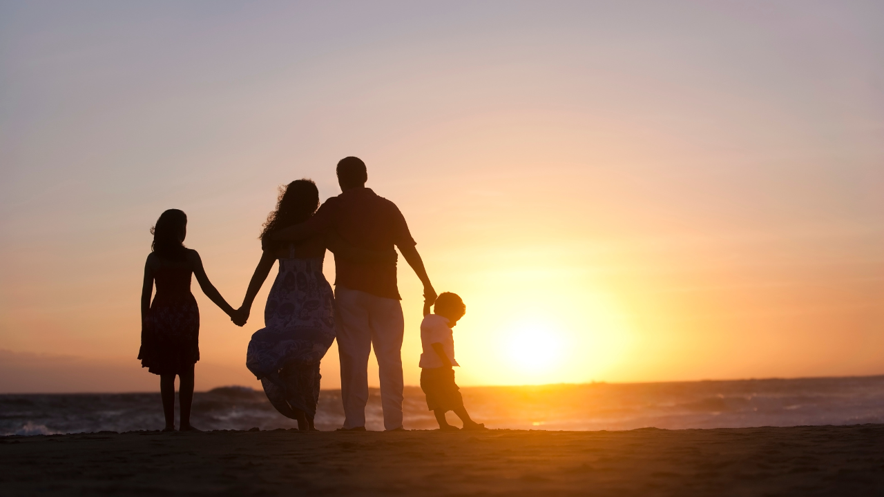 A family walking toward the sunset together, reminding us that the greatest legacies are not measured by what we leave behind, but by the values we pass on to future generations. Howard Edward Haller's story is one of those enduring legacies.