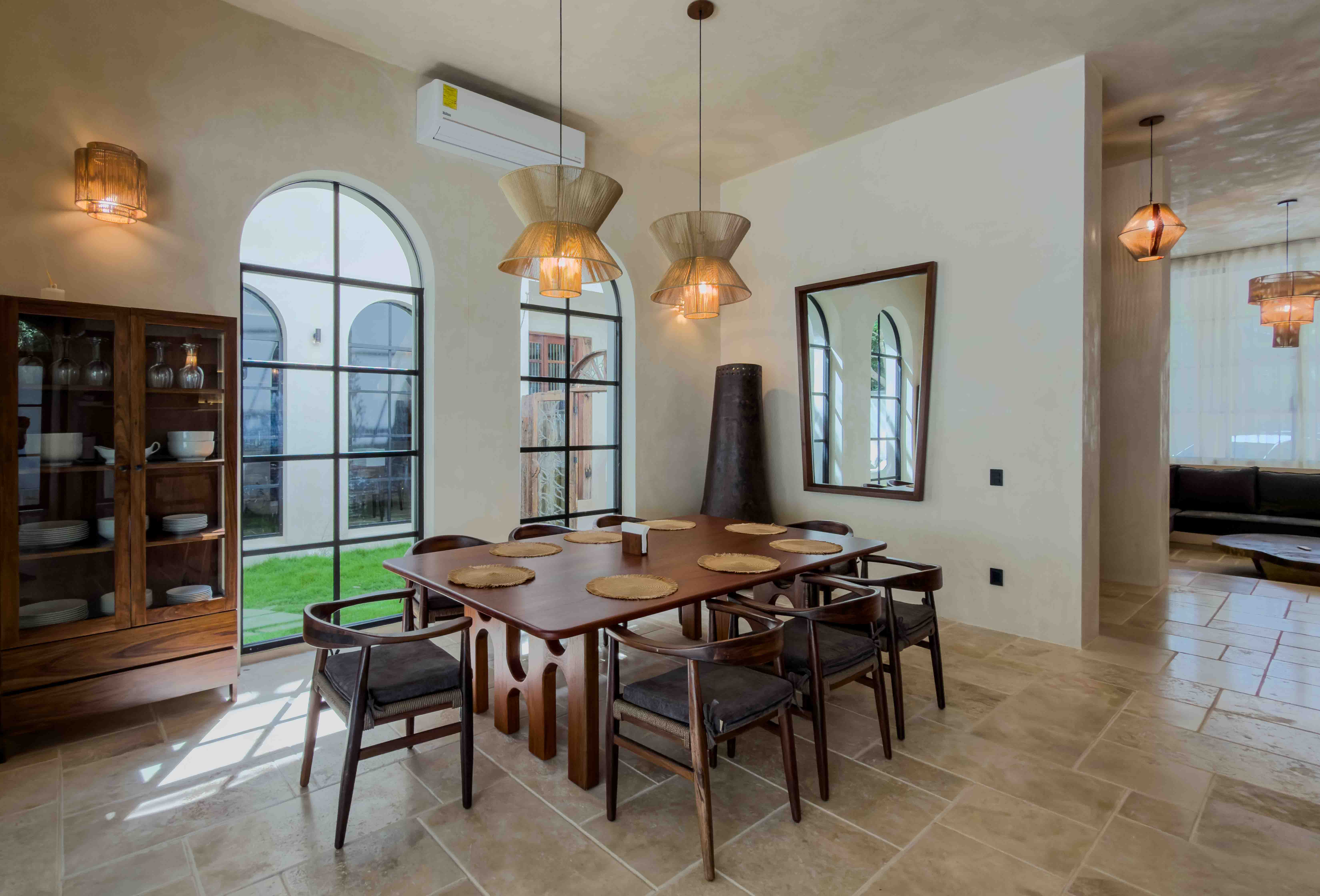 Indoor dining area with arched windows
