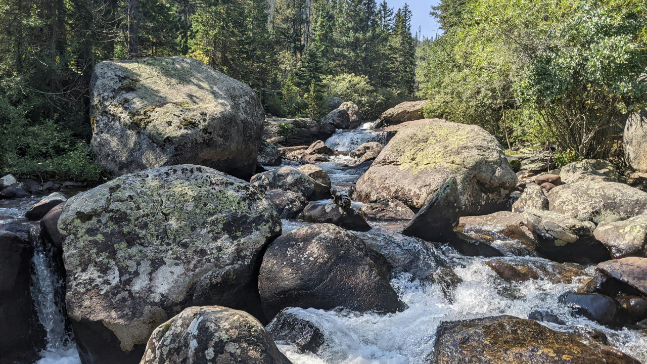 A creek pushing through large boulders - the tension of an IFS polarization