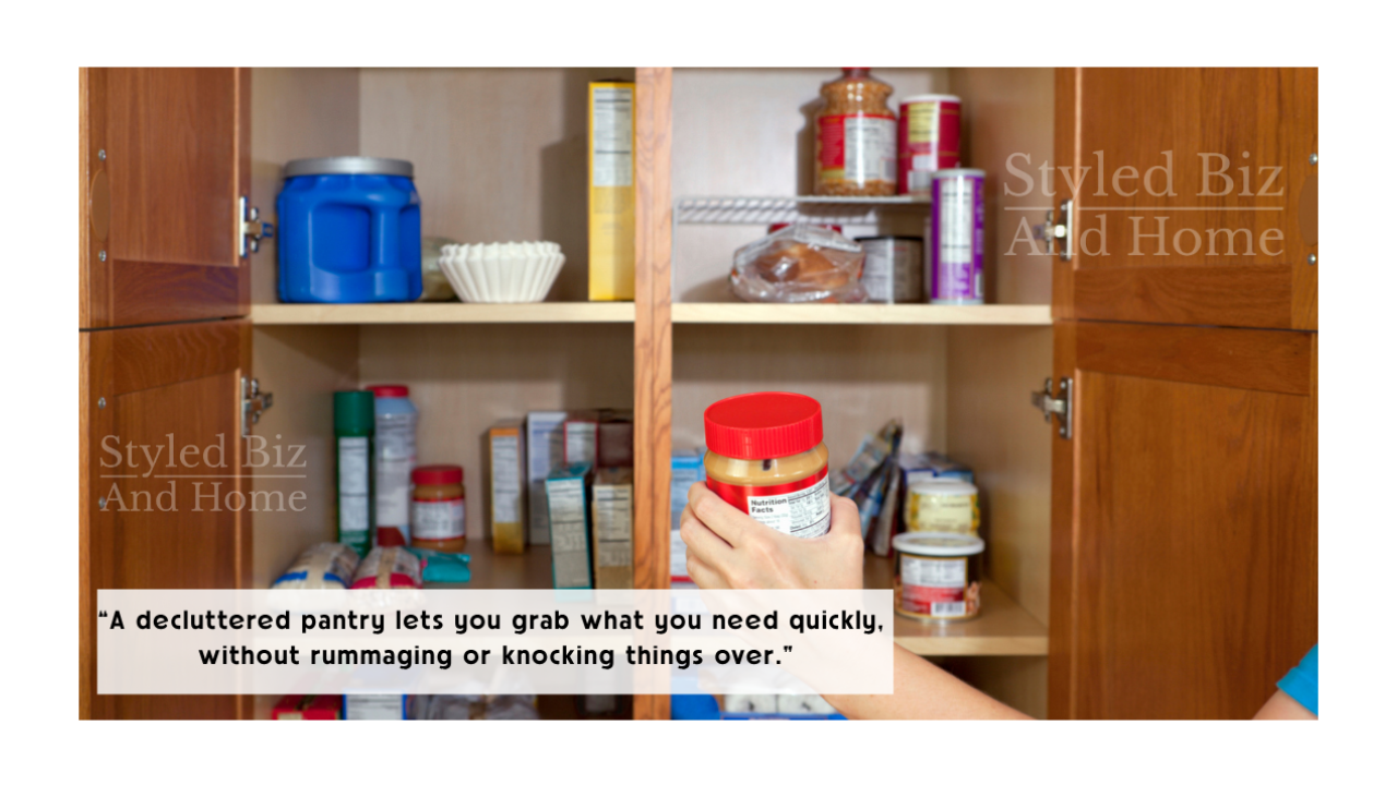 A decluttered pantry with a hand grabbing a peanut butter jar from it.