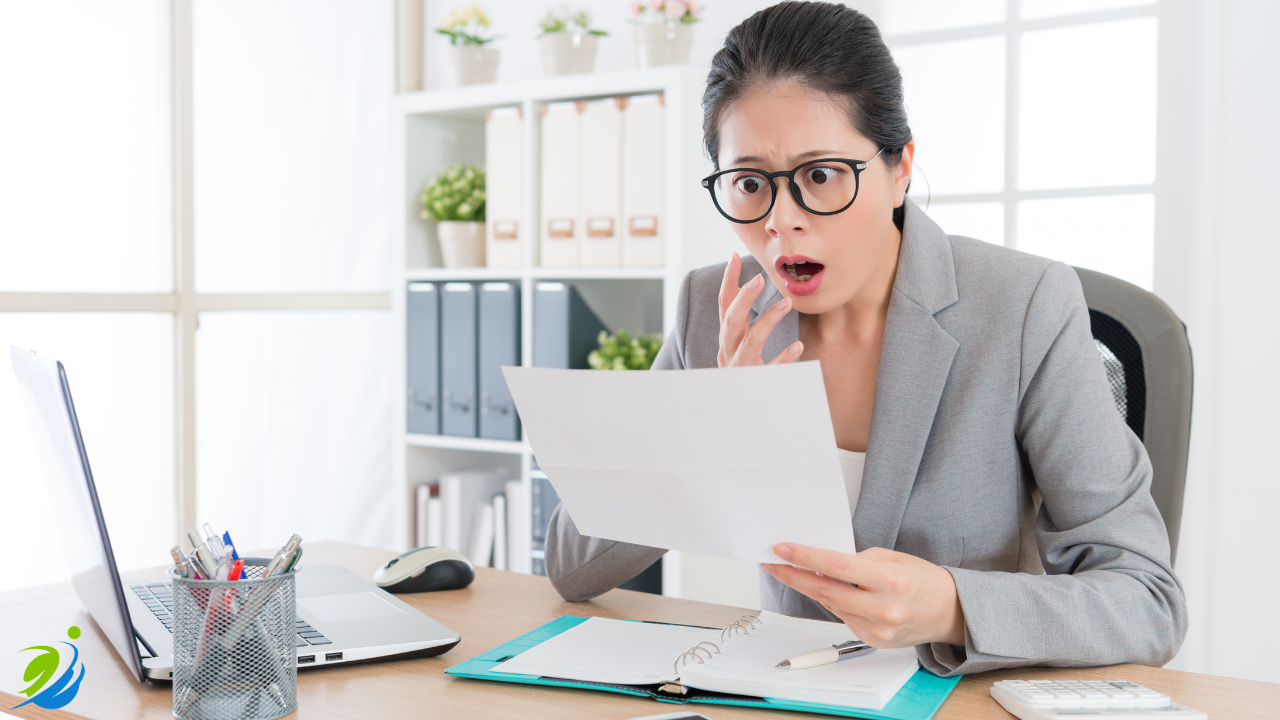 Restaurant manager reacting to an OSHA citation and reviewing restaurant workplace safety violations.