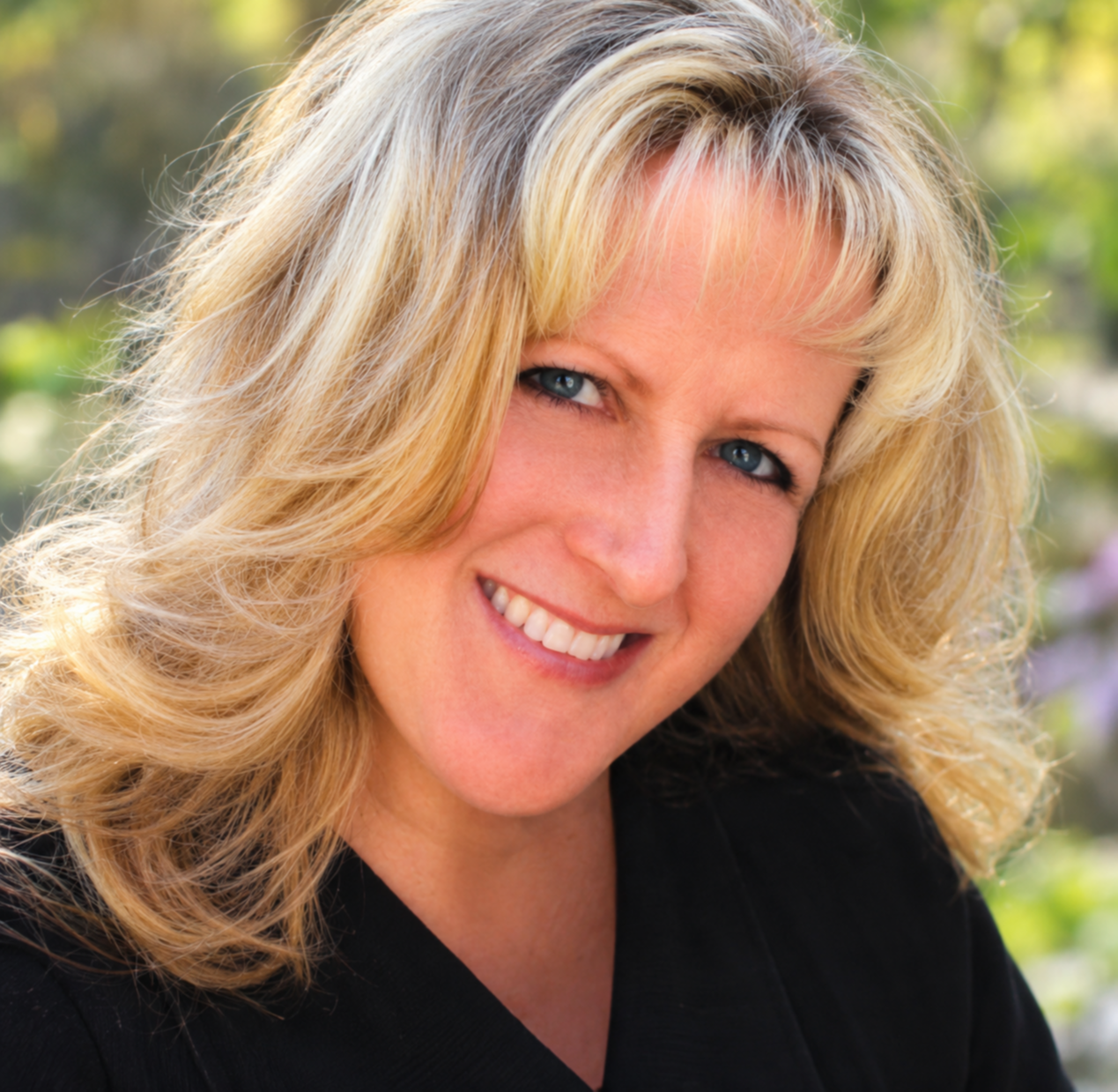 Rose Haller, founder of Restaurant Employee Safety Training (REST), smiling in a professional portrait.