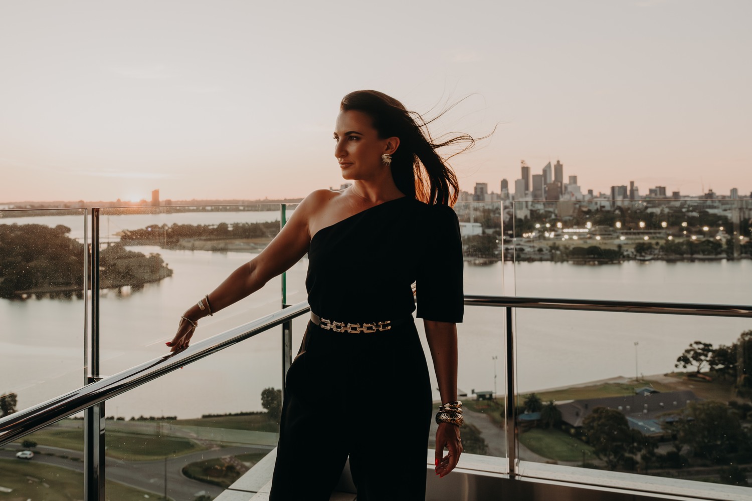 Michelle Rule on the penthouse balcony at sunset, High Flyers