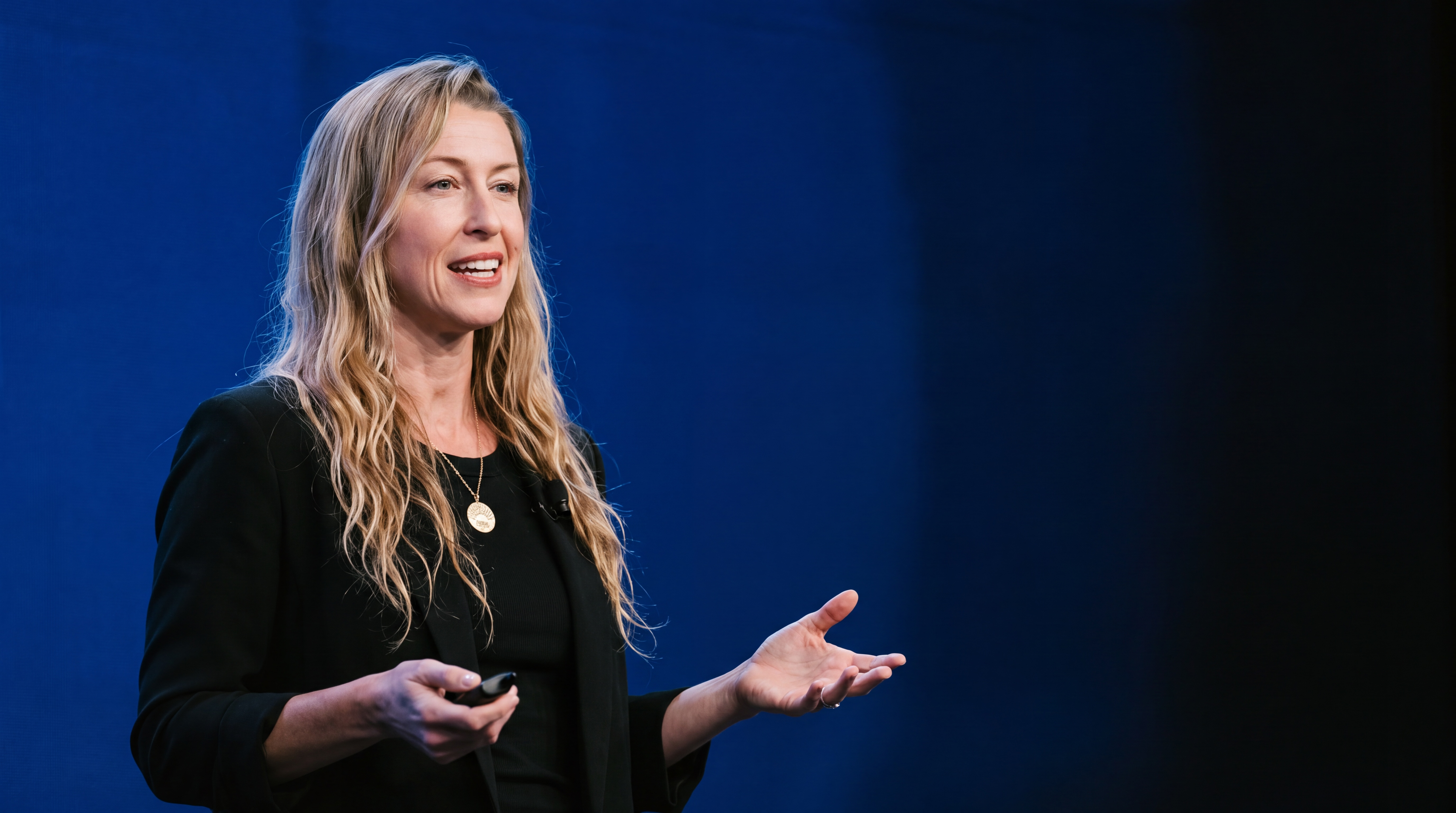 Dr. Jaclyn Normandie speaking on stage