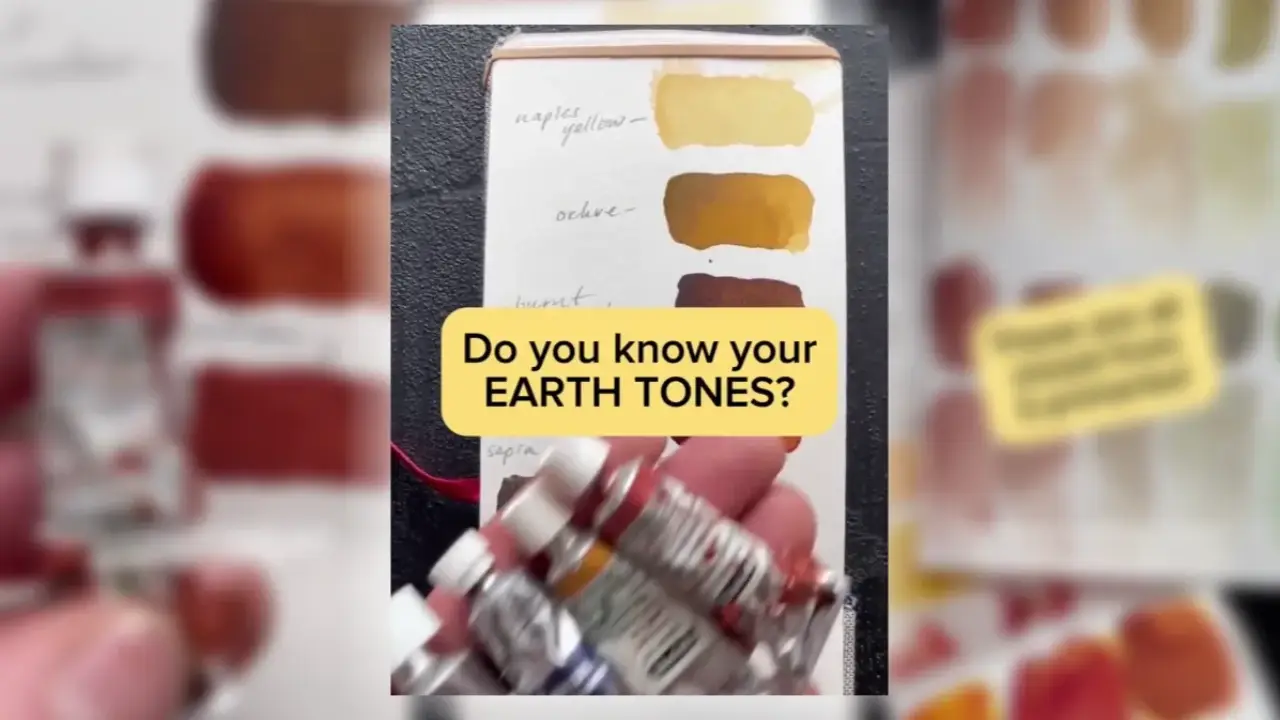 Artist Juliene holding watercolor paint tubes beside an earth tone color chart, showing warm brown, ochre, and yellow swatches for mixing natural earth tone watercolor colors.