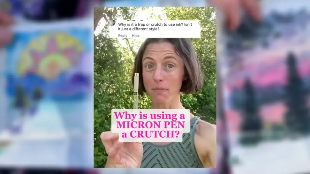 Artist Juliene holding a Micron pen outdoors while discussing why relying on ink can become a crutch in watercolor painting.
