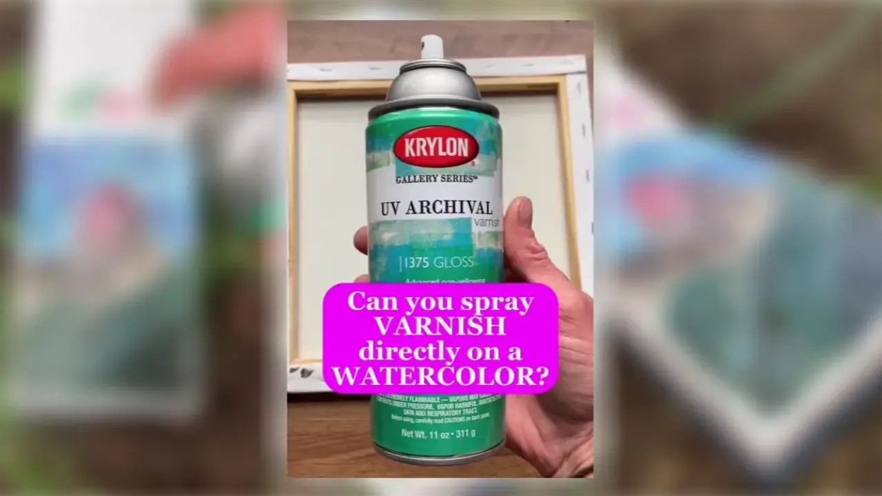 Juliene holding a Krylon UV Archival varnish spray can in front of a framed watercolor painting, exploring whether varnish can be sprayed directly on watercolor.