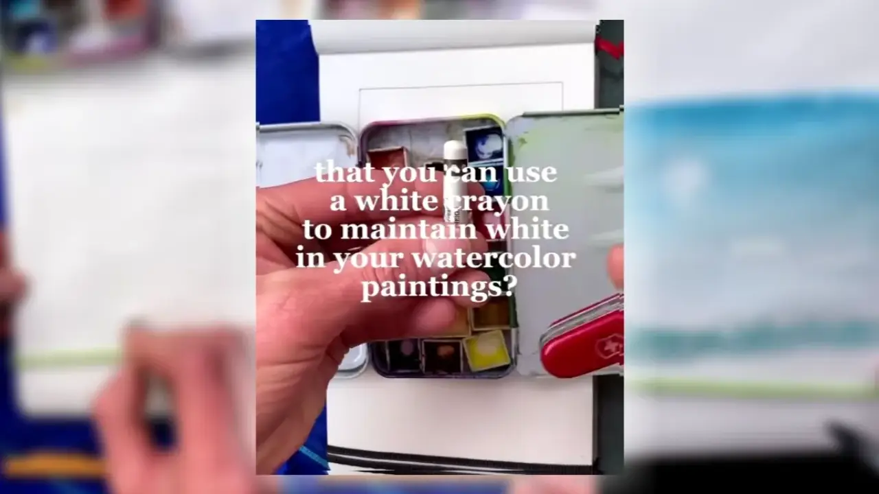 Artist Juliene holding a white crayon beside a watercolor palette and sketchbook, demonstrating the wax resist watercolor technique to preserve bright white highlights in watercolor paintings.
