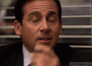 Michael Scott from The Office closing his eyes and rubbing his temples in frustration, then saying 'Okay' with visible exasperation