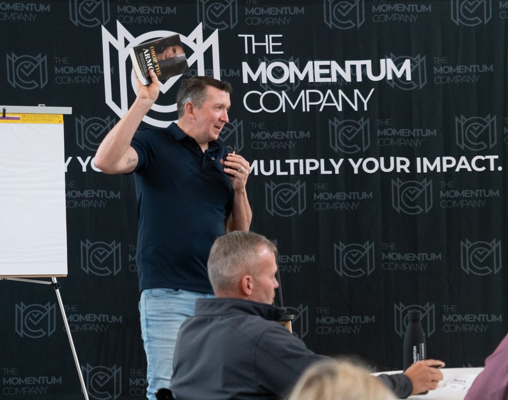Mark Jewell speaking to a room of leaders