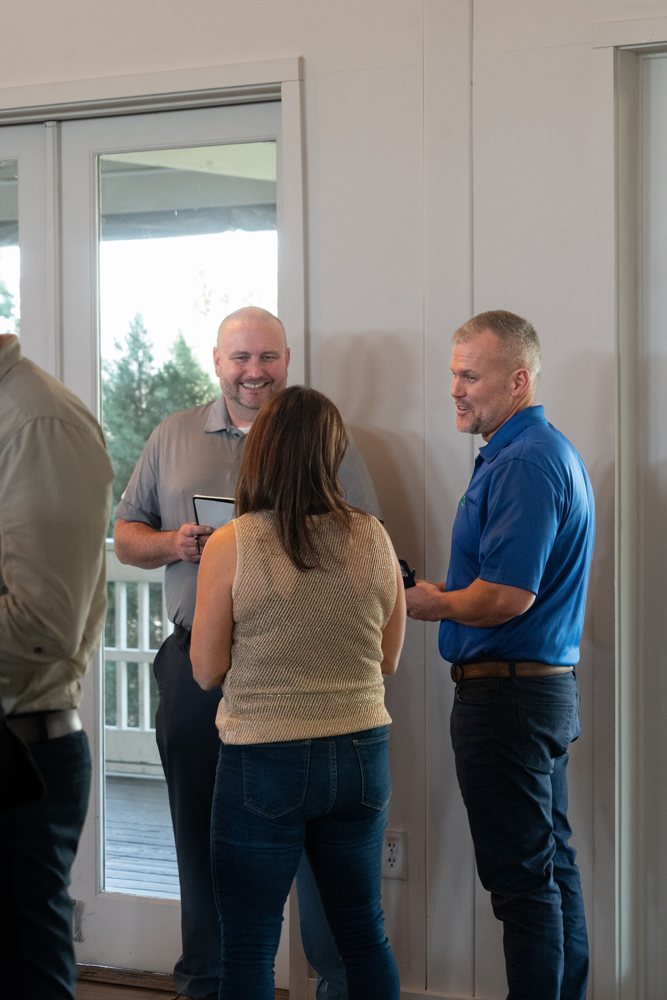 Leaders in conversation at a Momentum event