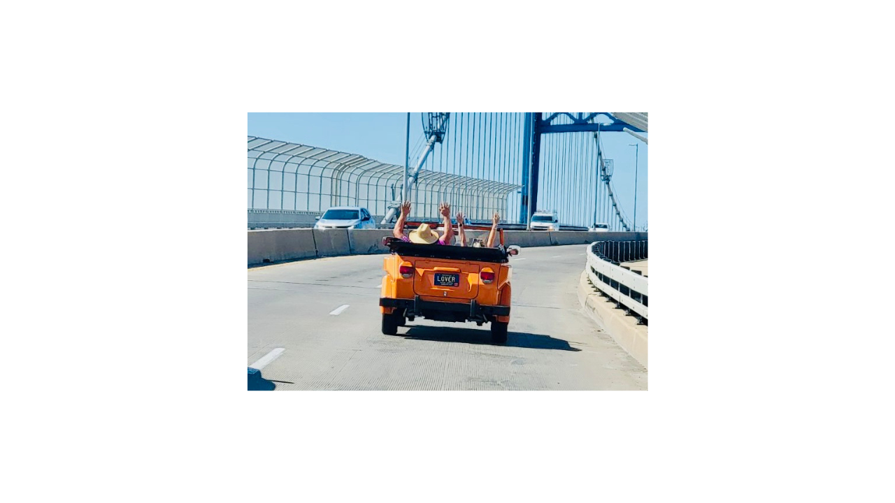 Michelle and Joe enjoying a ride in their 1974 Volkswagen Thing