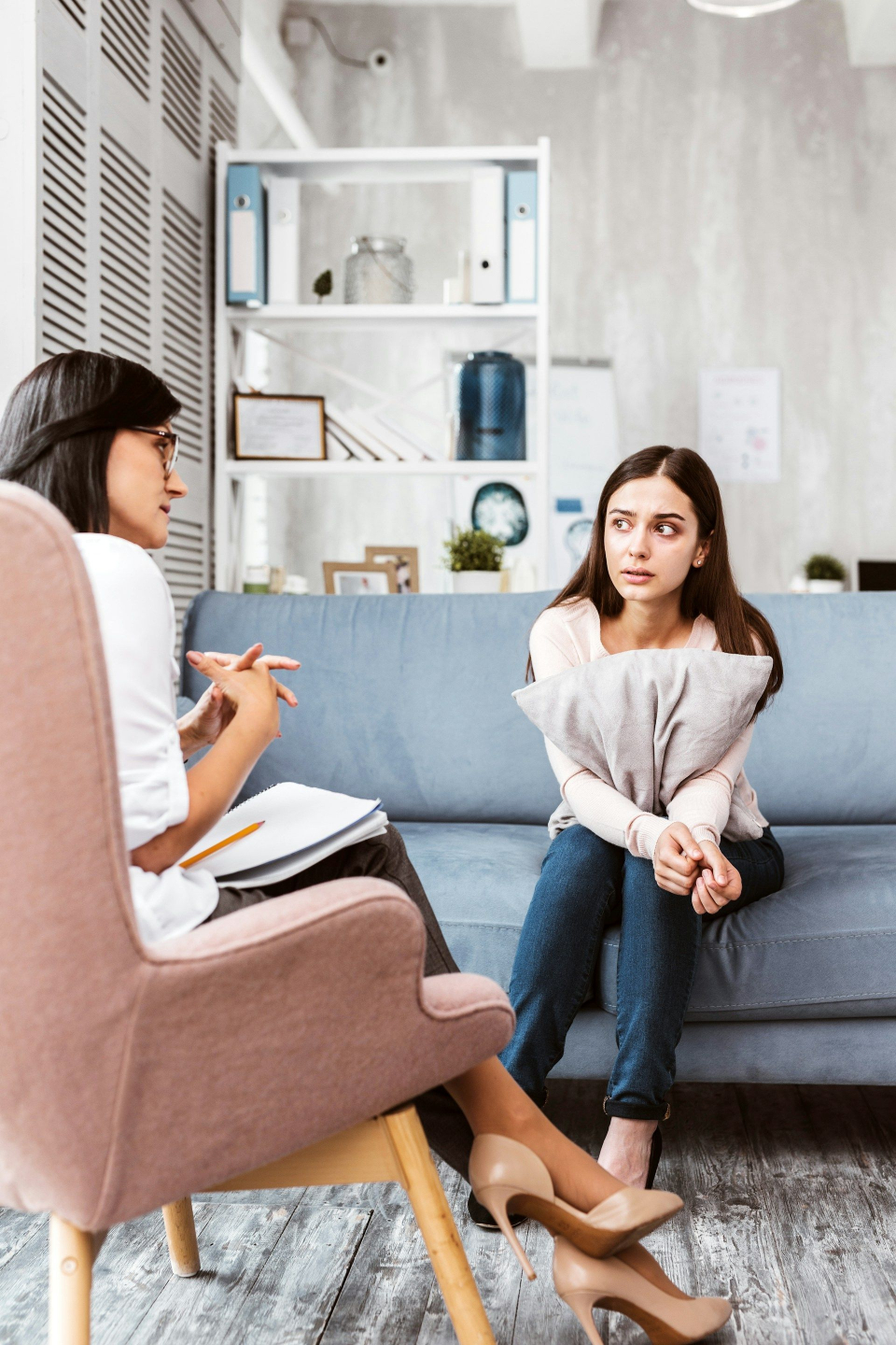 A trauma therapist observing signs of hesitation and resistance in a client before moving to EMDR reprocessing.