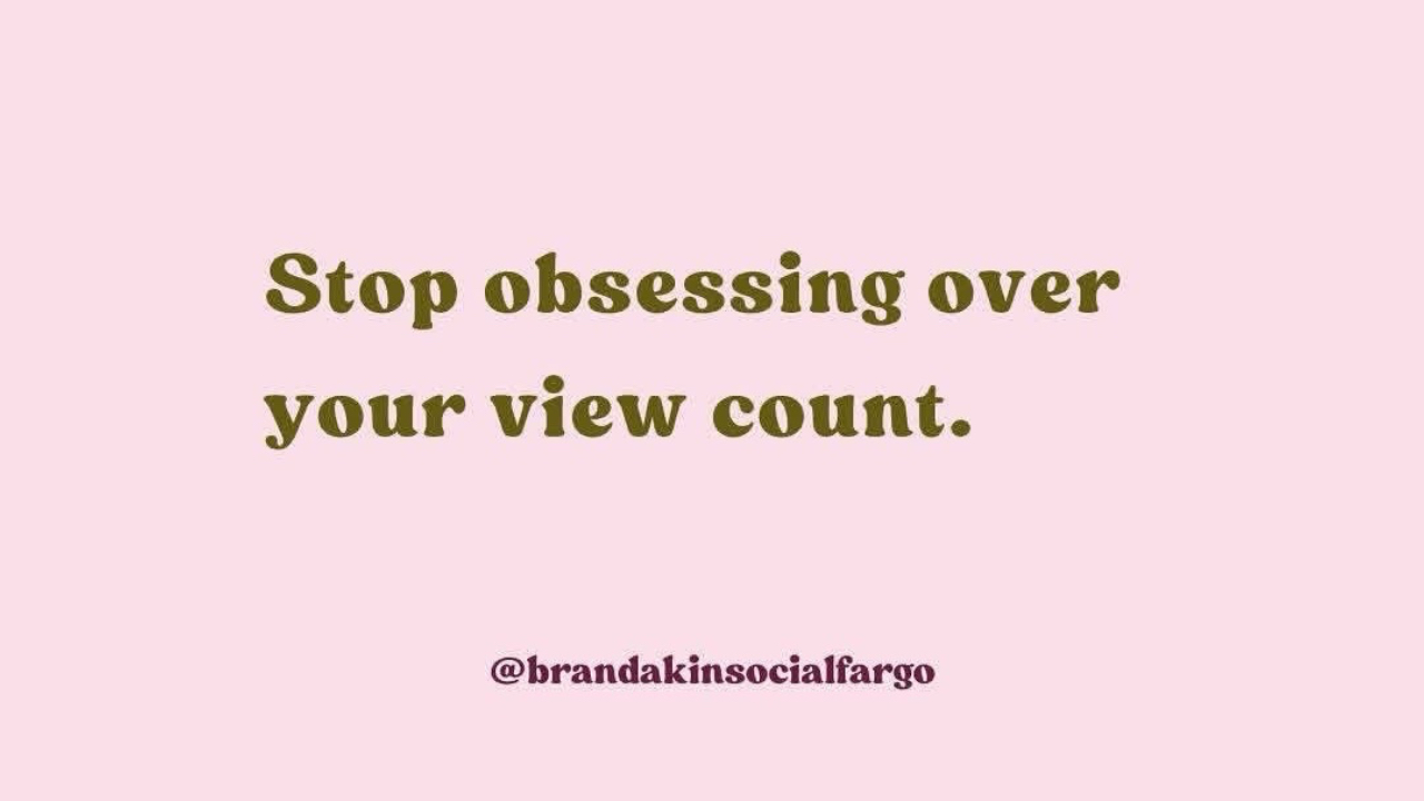 Text on a light pink background reads, "Stop obsessing over your view count." The Brandakin Social Media Instagram handle appears below the message.