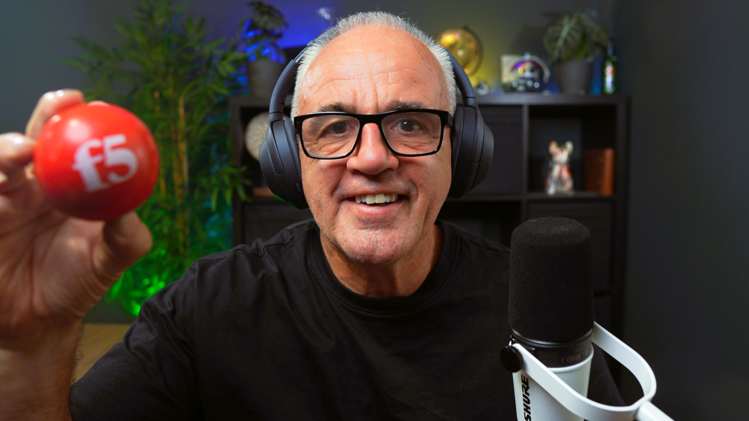 Graham Mattingley in his studio holding a red F5 ball
