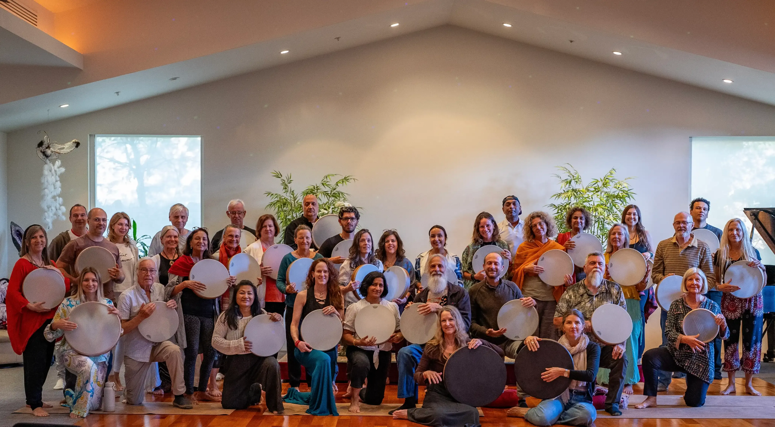 Krista Holland and a group of 30 frame drummers holding their frame drums in Sedona, Arizona width="1280" height="720"px