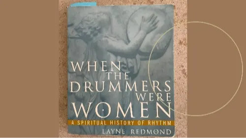 A "still life" of a frame drum surrounded by beautiful dusty pick roses