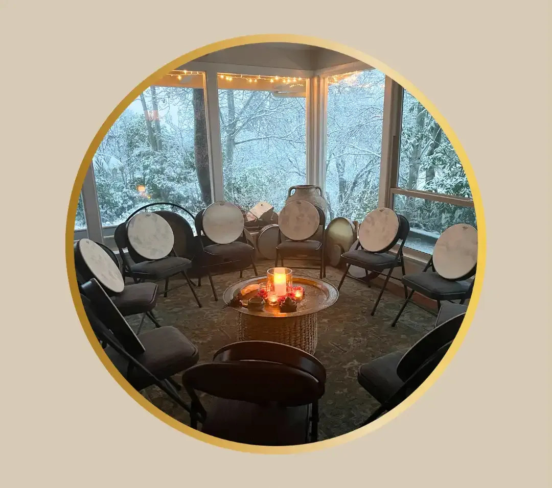 drum circle with frame drums and beautiful snowy scene