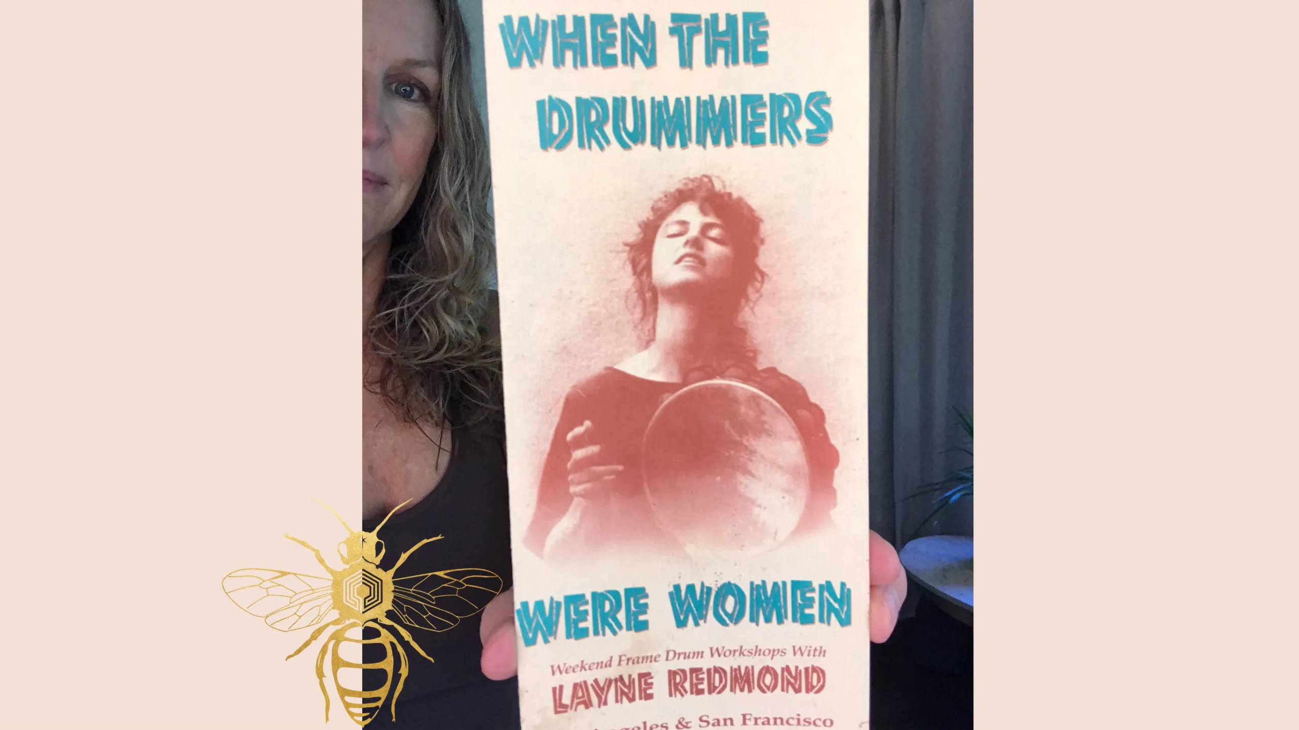 A "still life" of a frame drum surrounded by beautiful dusty pick roses