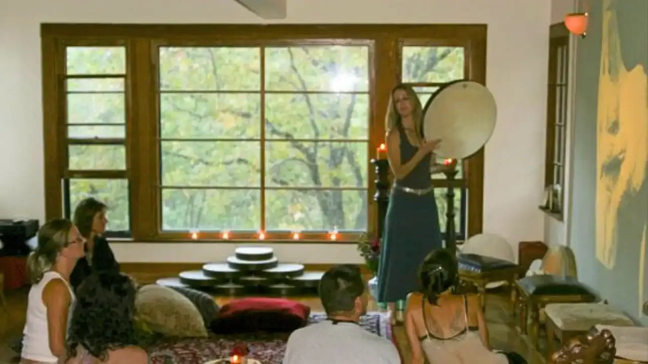 Krista Holland performing with her sacred frame drum and images from When the Drummers Were Women by Layne Redmond