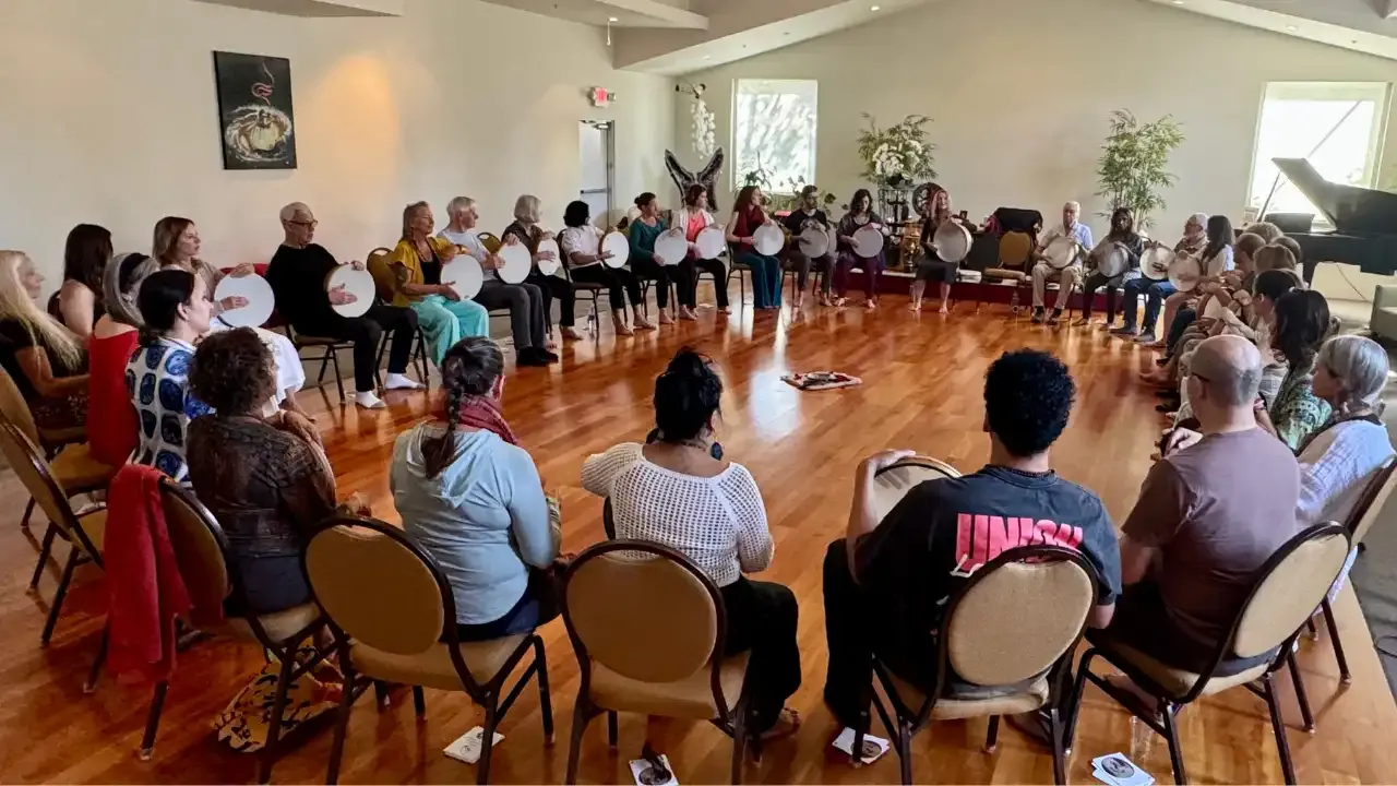 Krista Holland and a group of 30 frame drummers holding frame drums at a retreat in Sedona, Arizona width="1280" height="720"px