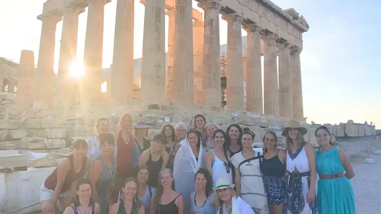 Krista Holland leading retreat in Athens, Greece at the parthenon with a group of 23 women