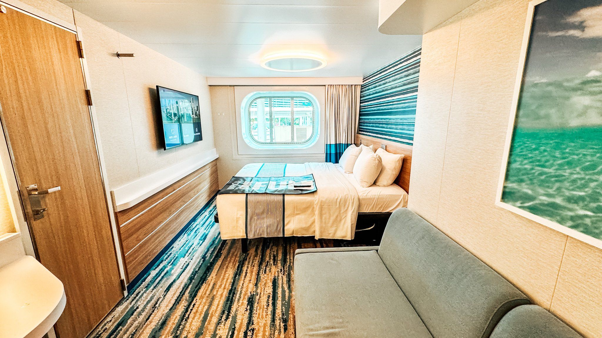 A cruise ship stateroom where stewards work hard and rely on tips