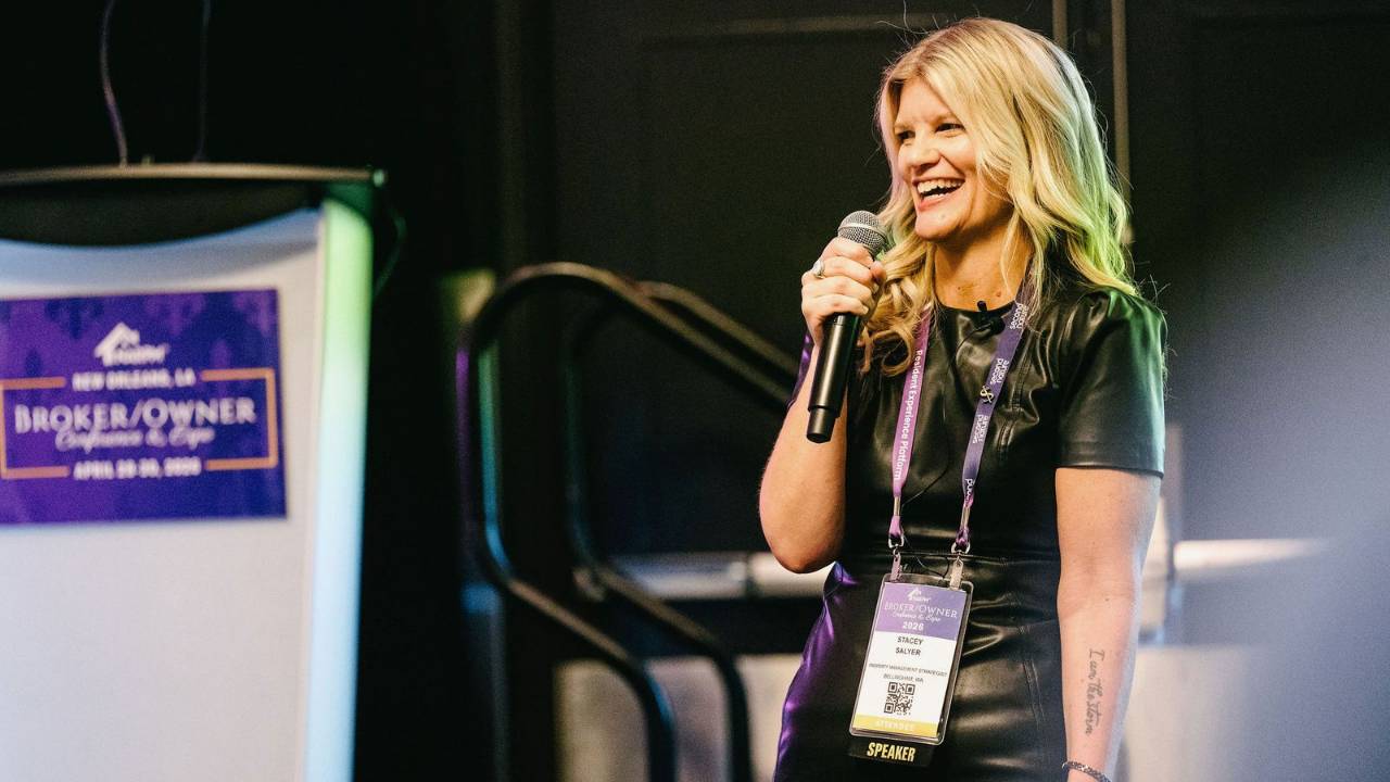 Stacey Salyer speaking into a microphone at the NARPM Broker/Owner Conference & Expo 2026 in New Orleans
