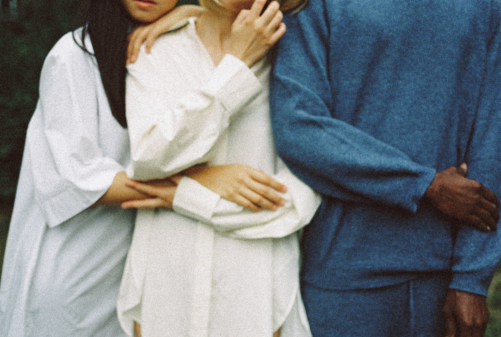 Friends holding each other close