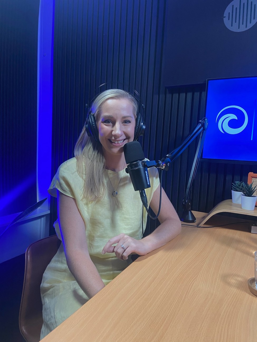 Ashleigh Conwell recording a podcast
