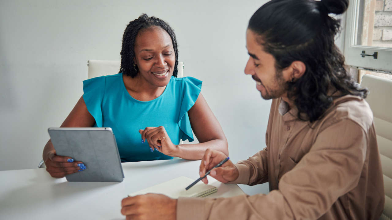 Networking coach guiding a professional through relationship-building strategies
