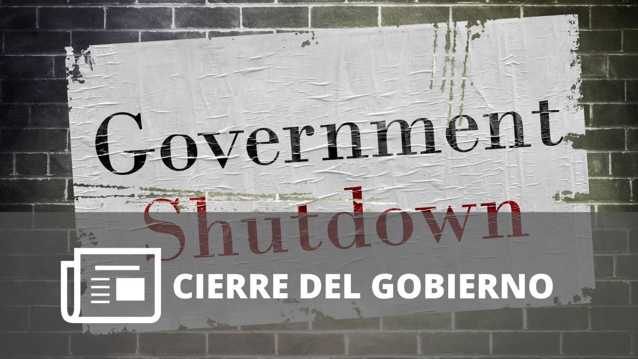 Cartel con el texto “Government Shutdown” sobre una pared oscura de ladrillos. 
