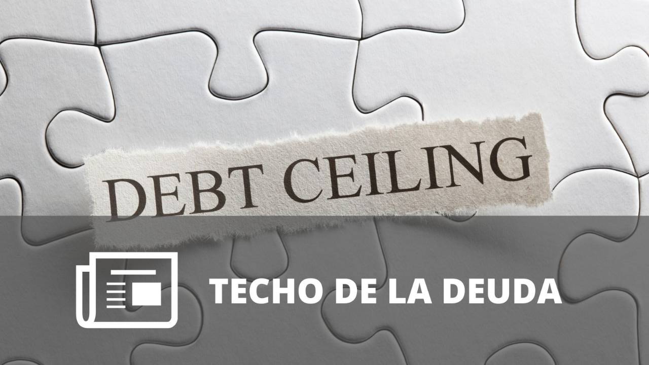 Piezas de rompecabezas blancas con una etiqueta central que dice “Debt Ceiling”. 