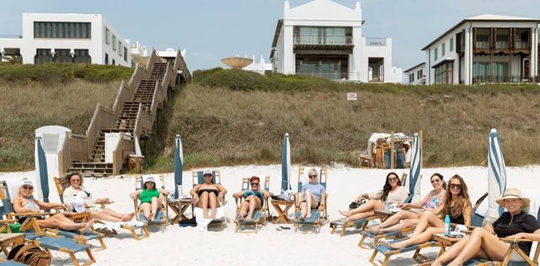 Retreat group relaxing in beach chairs
